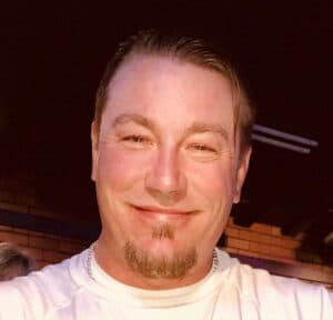 Smiling man with goatee portrait
