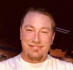 Smiling man with goatee portrait